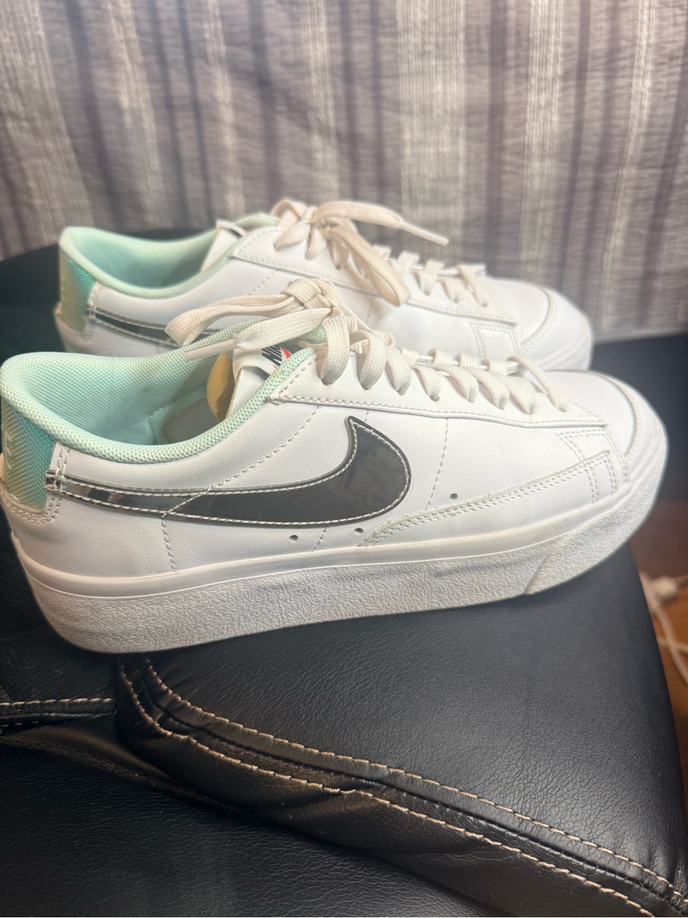 Nike Women's White Low-Top Sneakers with Black Swoosh and Mint Lining
